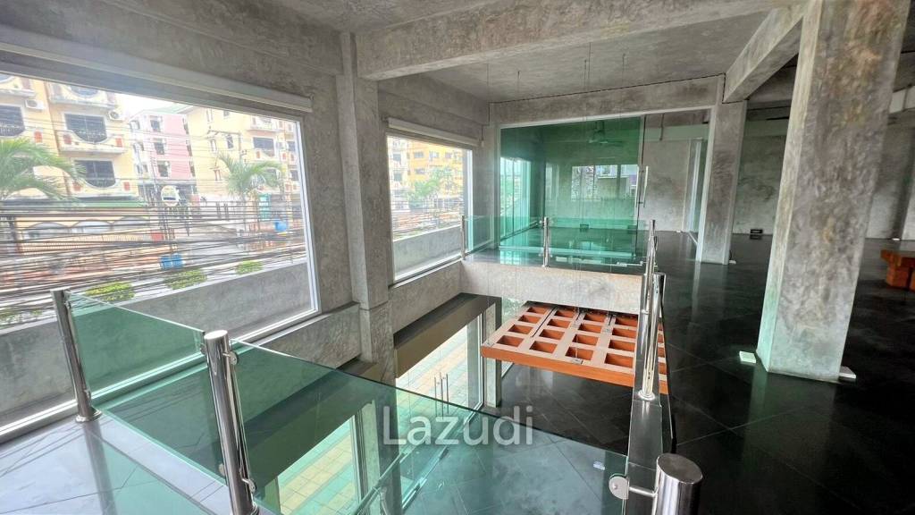 This is a three- storey building four-story property offering a distinct separation for tenants