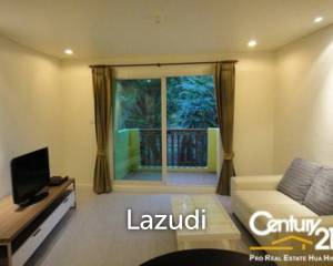 Beautifully Decorated Garden View Apartment in Town For Sale