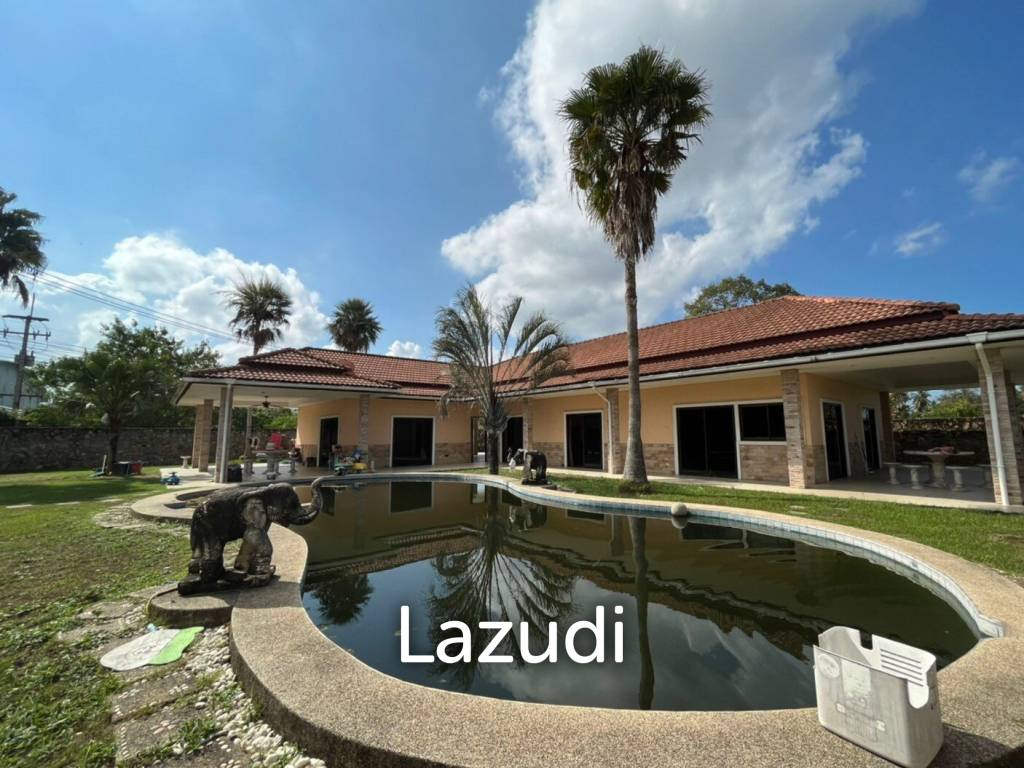 Land Including Private House for Sale in Pattaya