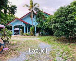 Land with House in Nong Mai Kaen for Sale