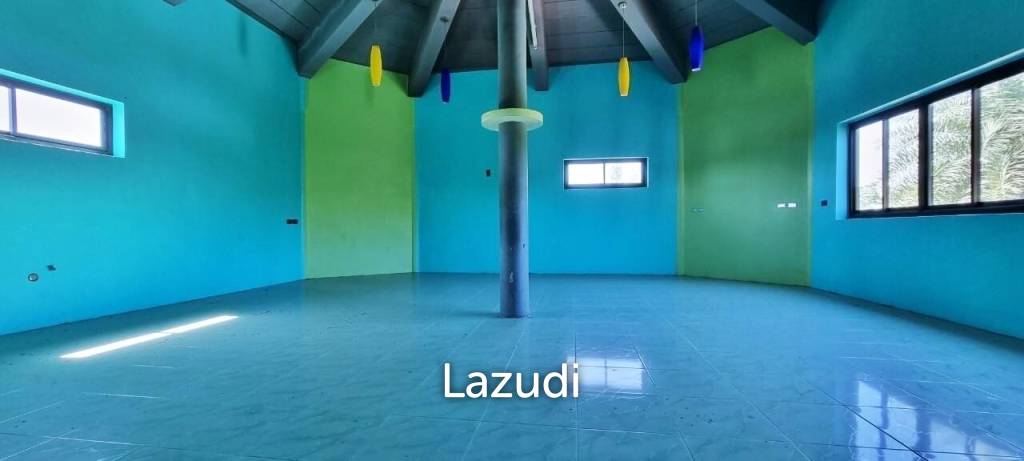 Land and Building for Sale in Huay Yai