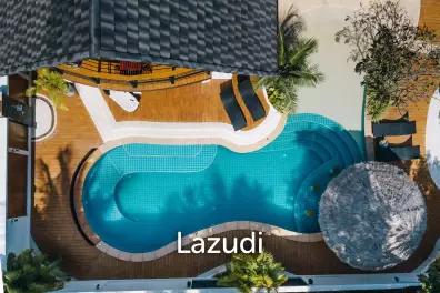 Luxury Living: A Grand 3-Bedroom Lagoon Pool Villa with Annex
