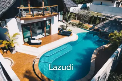 Luxury Living: A Grand 3-Bedroom Lagoon Pool Villa with Annex