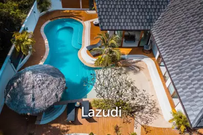 Luxury Living: A Grand 3-Bedroom Lagoon Pool Villa with Annex