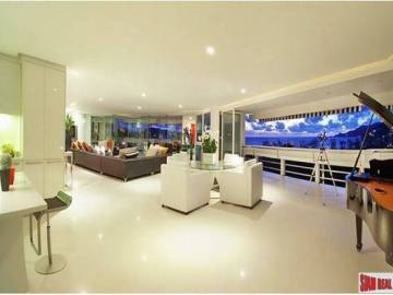 Andaman Beach Suites | Deluxe Modern Condo at World Famous Patong Beach, Phuket