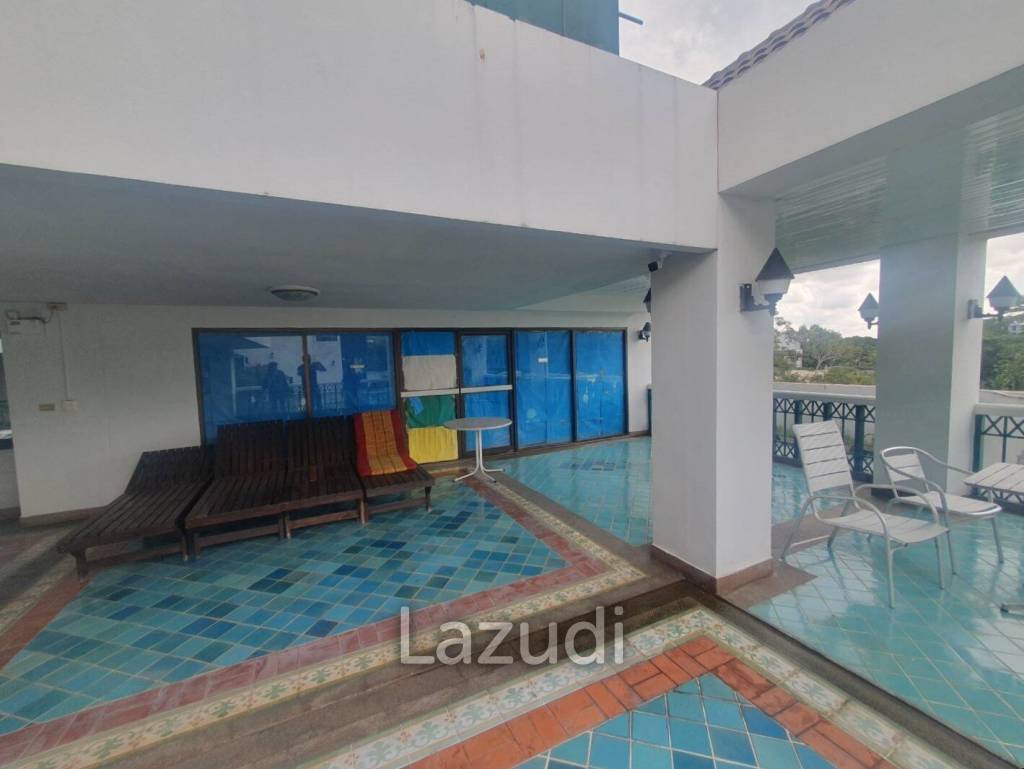 Penthouse unit in front of swimming pool