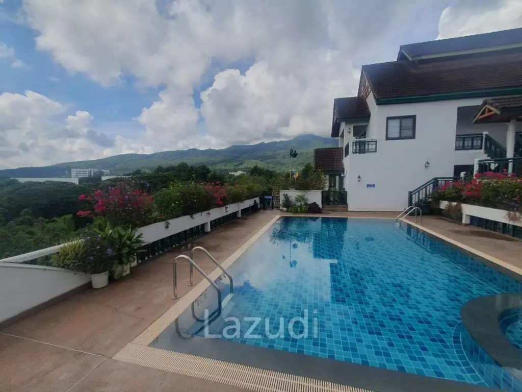 Penthouse unit in front of swimming pool