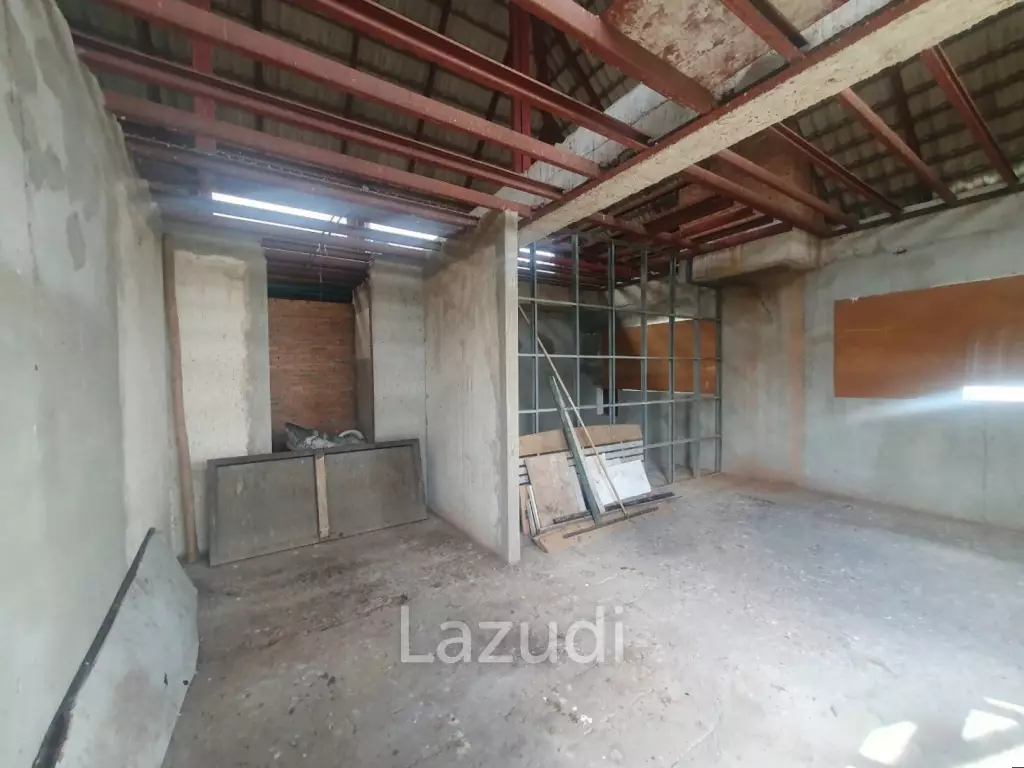 Penthouse unit in front of swimming pool