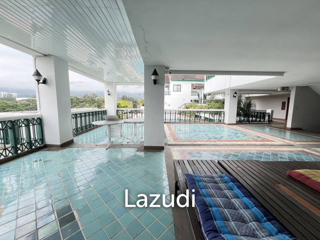 Penthouse unit in front of swimming pool