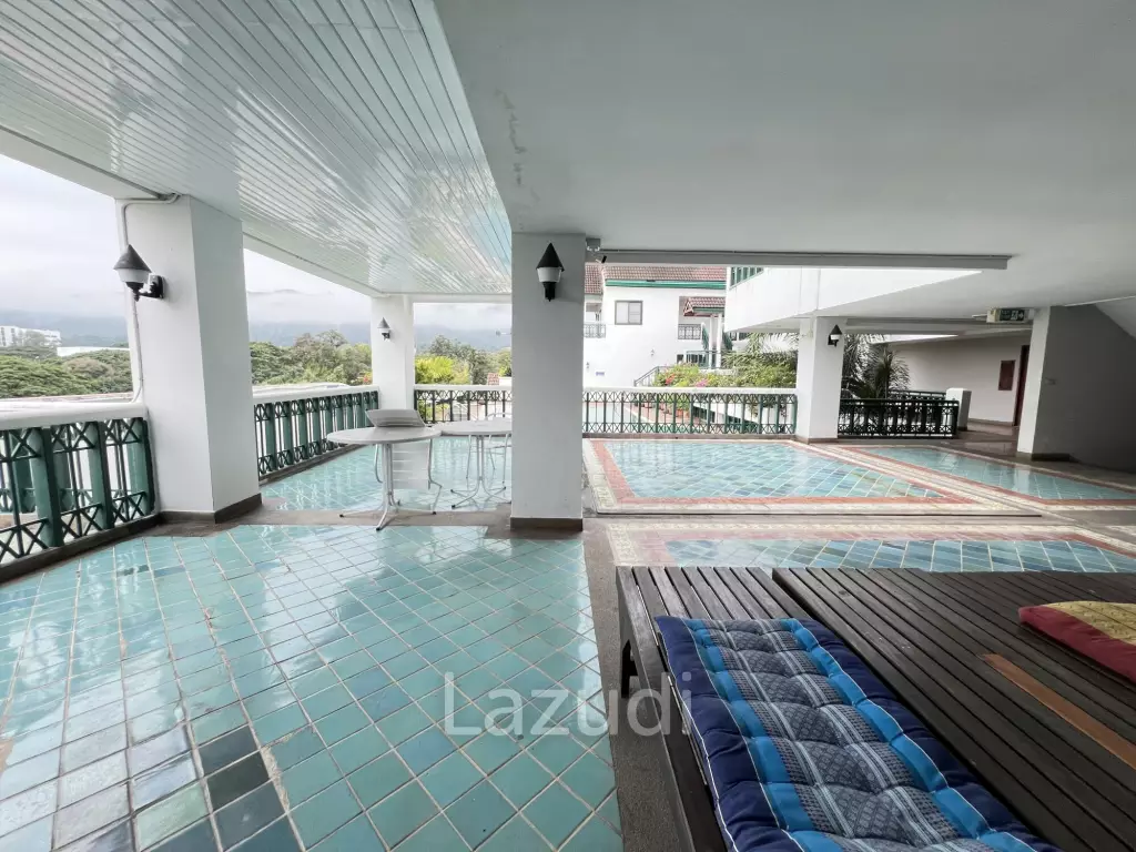 Penthouse unit in front of swimming pool