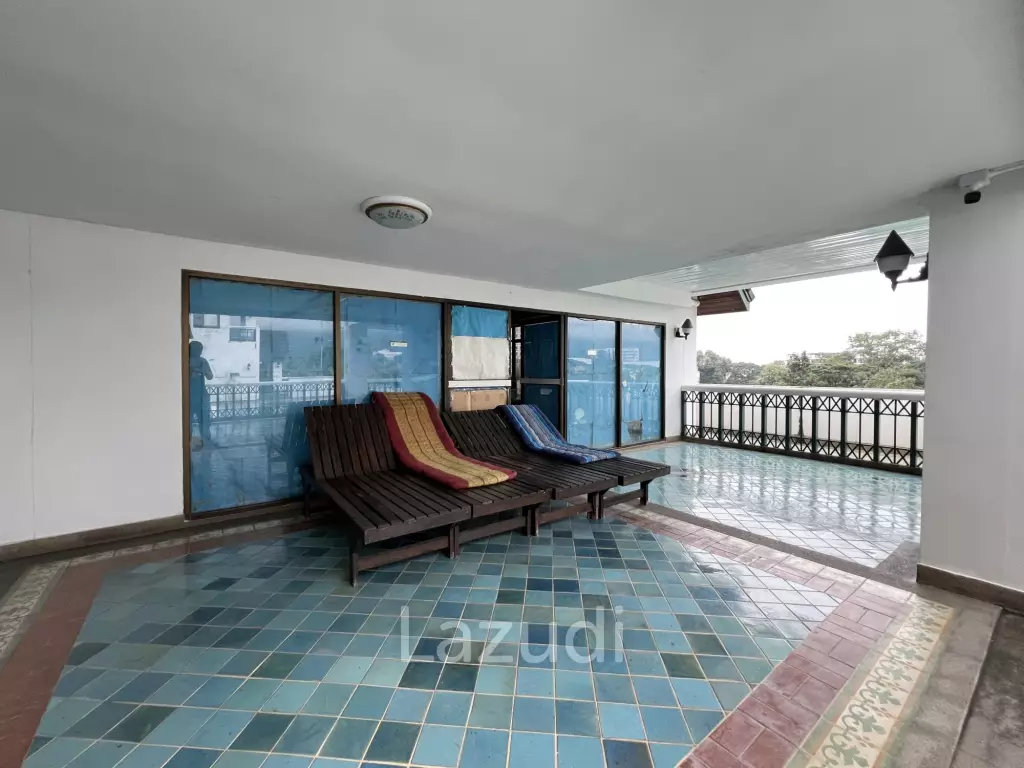 Penthouse unit in front of swimming pool