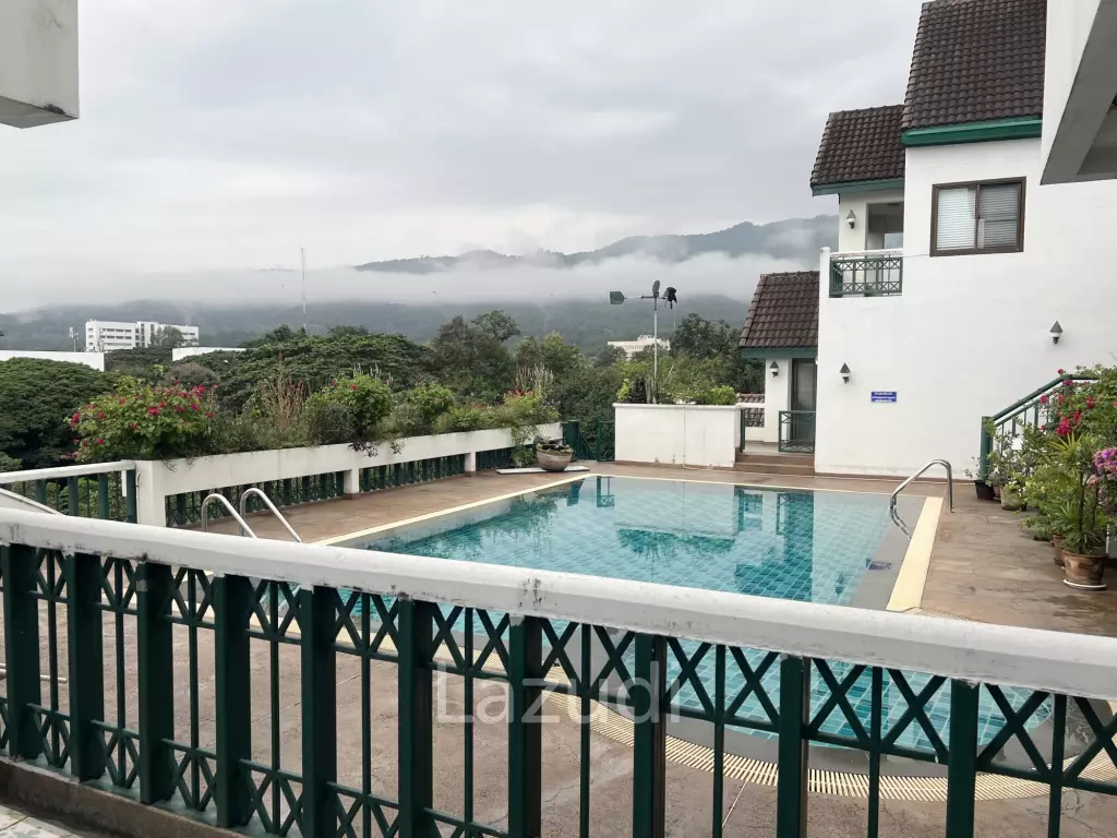 Penthouse unit in front of swimming pool
