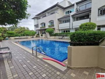 Baan Charoenmitr | Large Family Style Three Bedroom Townhouse for Sale on Quiet Ekkamai Alley
