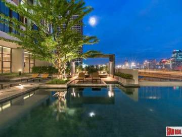 Chewathai Residence Asoke | Brightly Decorated City View Condo with Loft-style Bedroom near MRT Rama 9