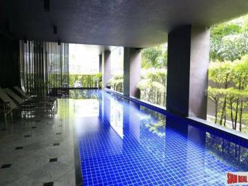 Noble Reveal Condominium | Two Bedroom Corner Condo with Wrap Around Windows and Fantastic City Views in Ekkamai