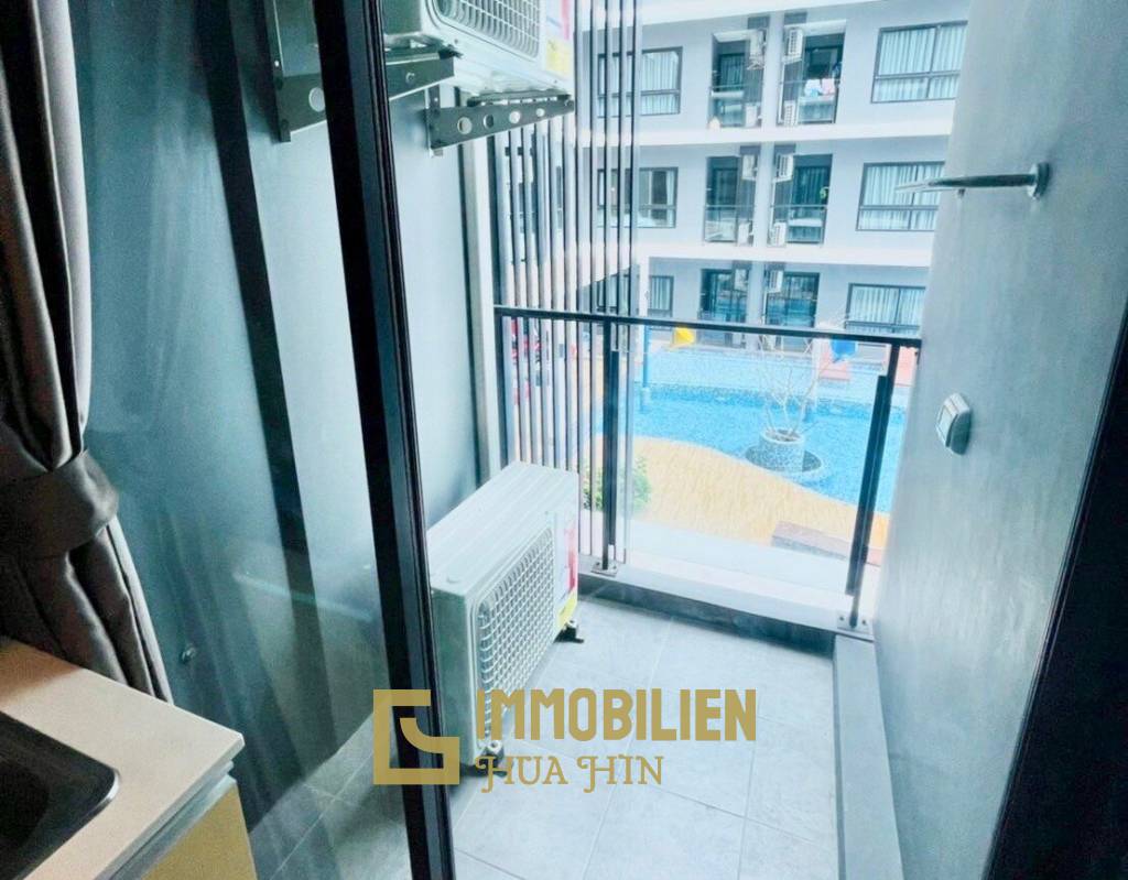 Maysa Condo: 1-Schlafzimmer-Eigentumswohnung mit Poolblick