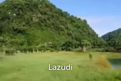 Tranquil 3 Rai Property with a Scenic Lake Between Khanom and Sichon