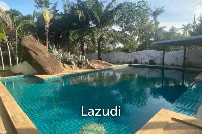 Serene Luxury Unveiled: 400 sqm Villa on 1600 sqm  with Rock-Embedded Pool and Picturesque Park Views