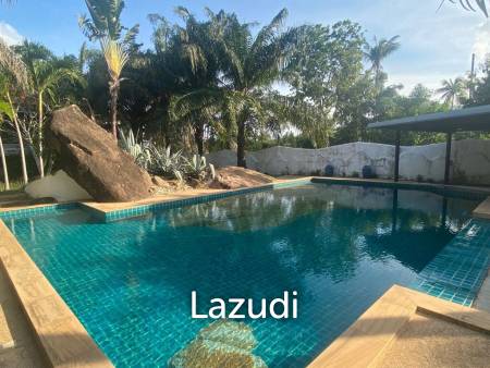 Serene Luxury Unveiled: 400 sqm Villa on 1600 sqm  with Rock-Embedded Pool and Picturesque Park Views