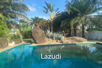 Serene Luxury Unveiled: 400 sqm Villa on 1600 sqm  with Rock-Embedded Pool and Picturesque Park Views