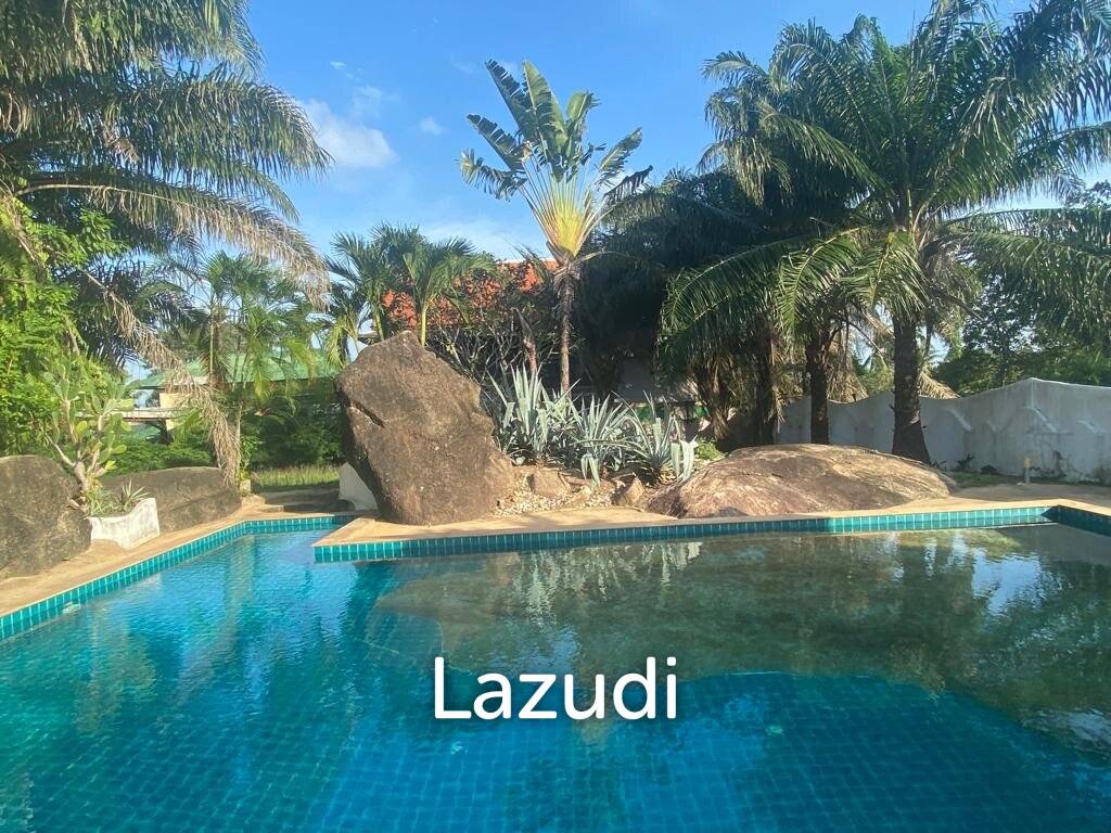 Serene Luxury Unveiled: 400 sqm Villa on 1600 sqm  with Rock-Embedded Pool and Picturesque Park Views