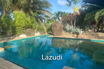 Serene Luxury Unveiled: 400 sqm Villa on 1600 sqm  with Rock-Embedded Pool and Picturesque Park Views