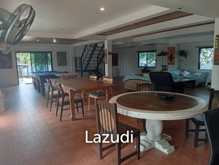 Serene Luxury Unveiled: 400 sqm Villa on 1600 sqm  with Rock-Embedded Pool and Picturesque Park Views