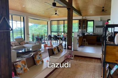 Seaside Opulence: 5-Bedroom Villa in Haad Yao Hills with Ship-Shaped Guest House, Kitchen, Sala, and Vast Landscaped Grounds