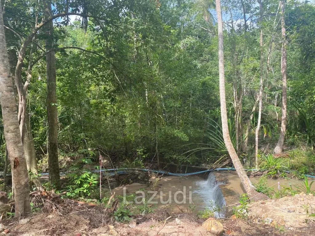 Riverside Bliss: Exclusive Land Development with Mountain Views in Sritanu, Koh Phangan
