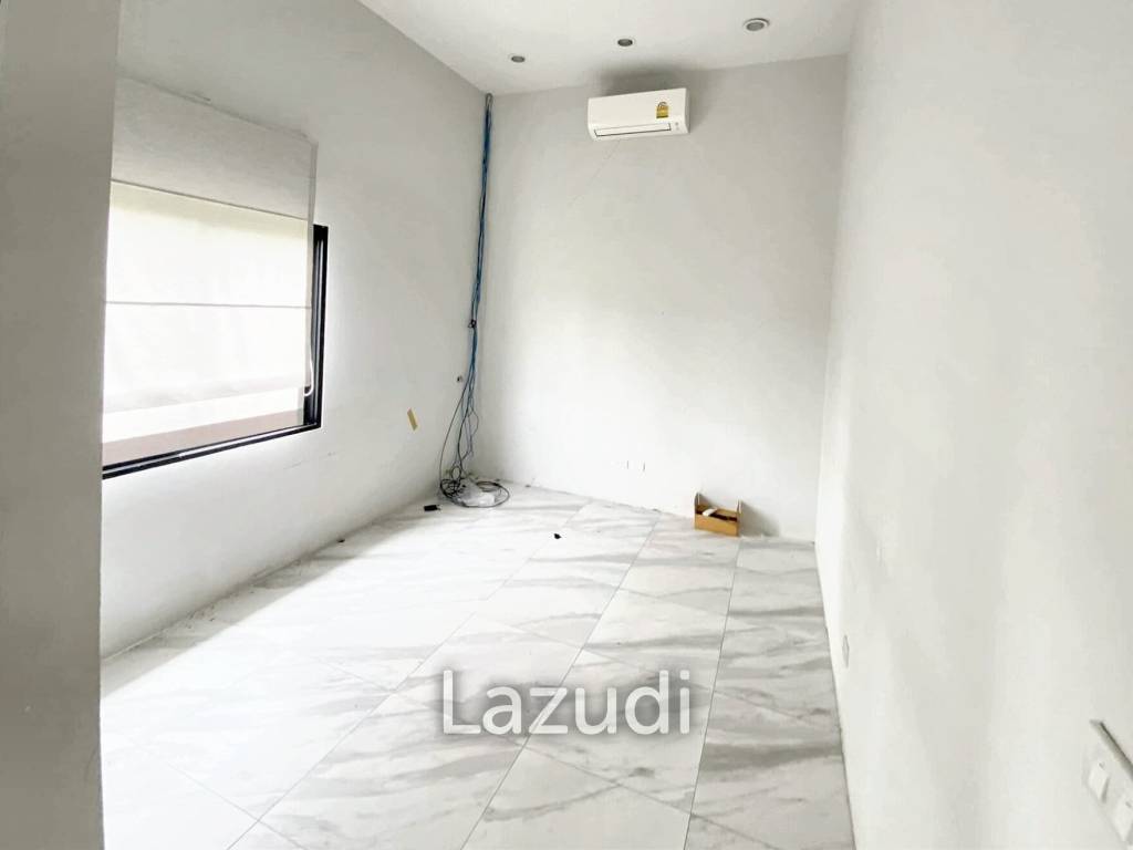 Land with buildings 1,404 SQ.M Bearing area