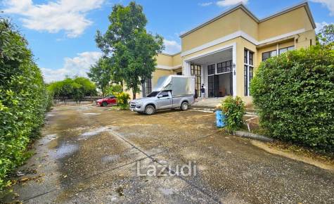 Land with buildings 1,404 SQ.M Bearing area