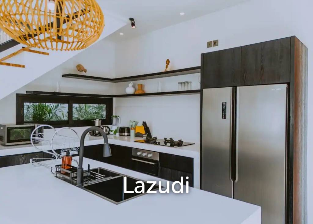 MODERN PERERENAN VILLA: STYLISH LIVING IN A TROPICAL HAVEN