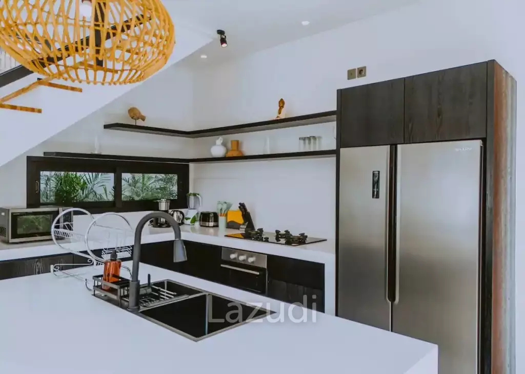 MODERN PERERENAN VILLA: STYLISH LIVING IN A TROPICAL HAVEN