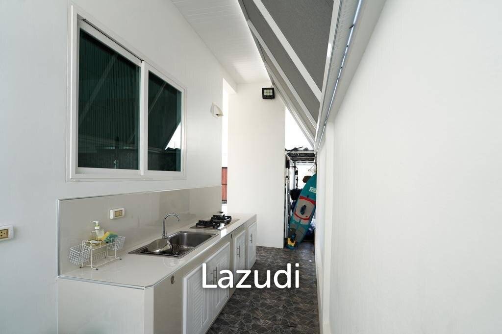 12.5 kW solar system with battery / tiled exterior / Thai outdoor kitchen