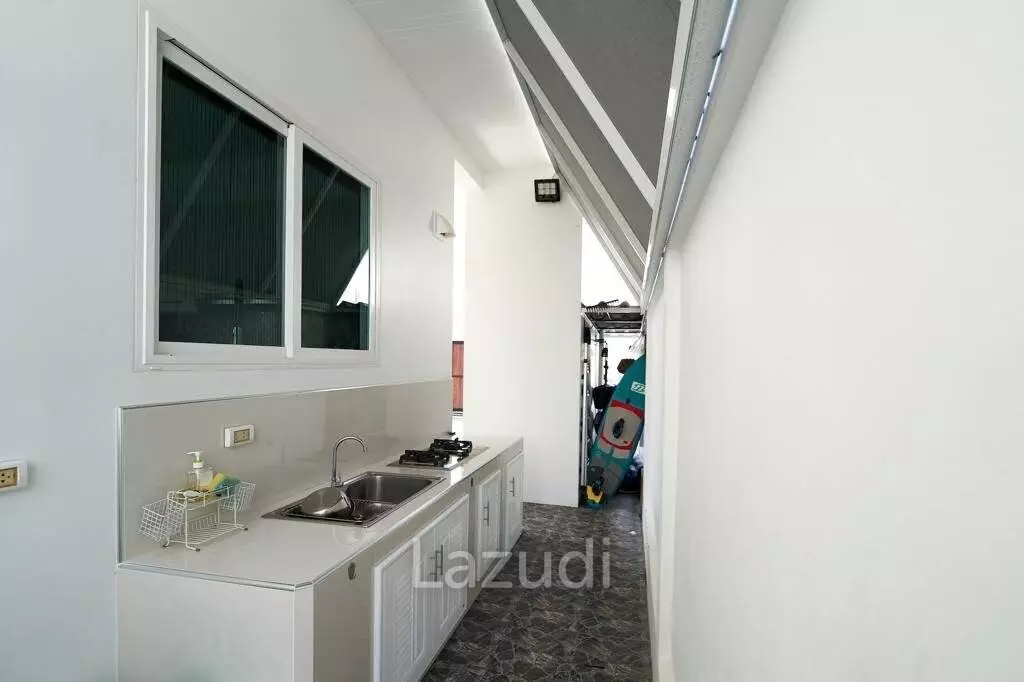 12.5 kW solar system with battery / tiled exterior / Thai outdoor kitchen