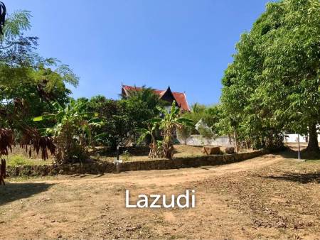 3.75 Rai Land with Spacious 3-Story Villa and Additional 3-Story House, Walking Distance to Yanui Beach