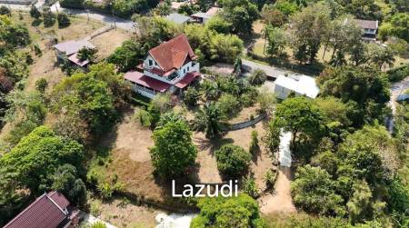 3.75 Rai Land with Spacious 3-Story Villa and Additional 3-Story House, Walking Distance to Yanui Beach