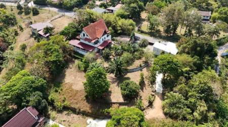 3.75 Rai Land with Spacious 3-Story Villa and Additional 3-Story House, Walking Distance to Yanui Beach