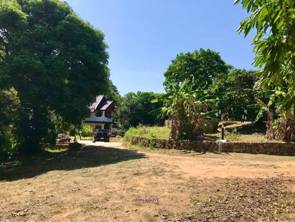 3.75 Rai Land with Spacious 3-Story Villa and Additional 3-Story House, Walking Distance to Yanui Beach