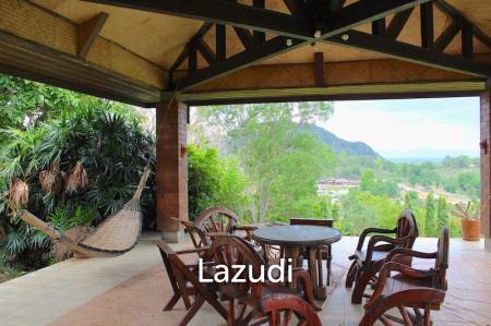Luxurious house surrounded by mountains on 22 rai.