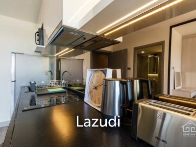 Cozy condo in town and beach
