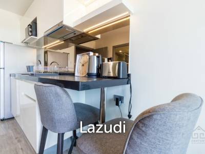 Cozy condo in town and beach