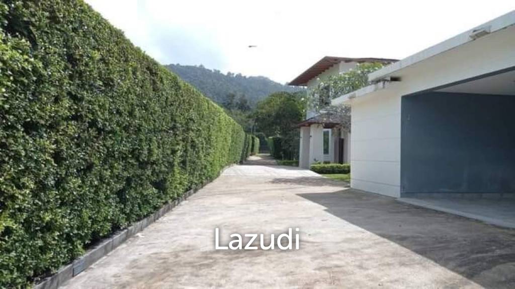 Stunning 7 Rai Of Property With 2 villas Near Phuket International Airport.