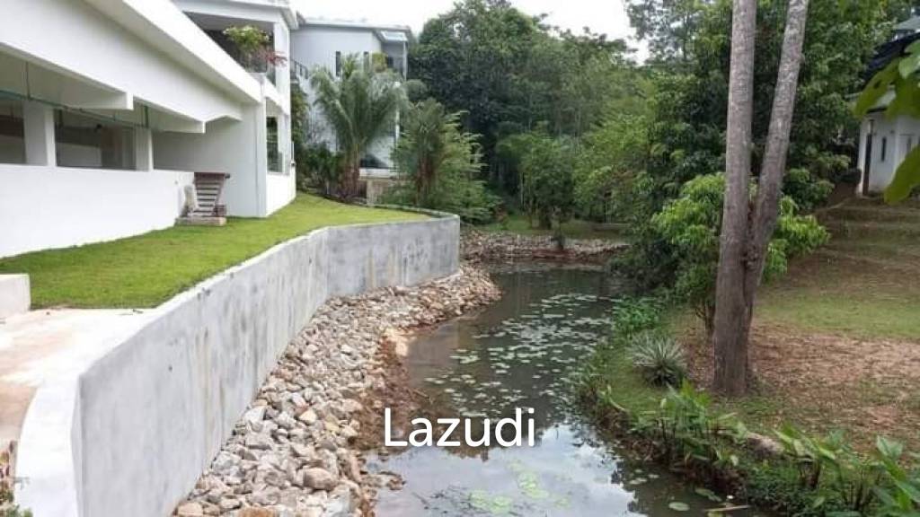 Stunning 7 Rai Of Property With 2 villas Near Phuket International Airport.