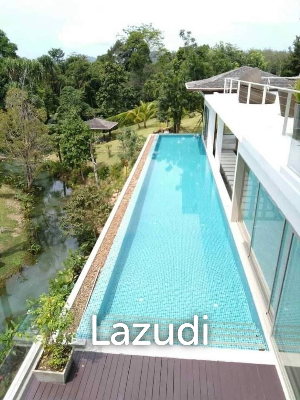 Stunning 7 Rai Of Property With 2 villas Near Phuket International Airport.