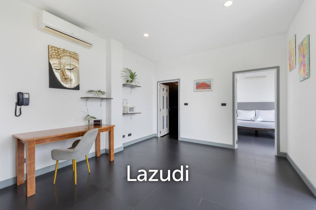 An Exquisite 11-Bedroom Hillside Villa with Ocean Views