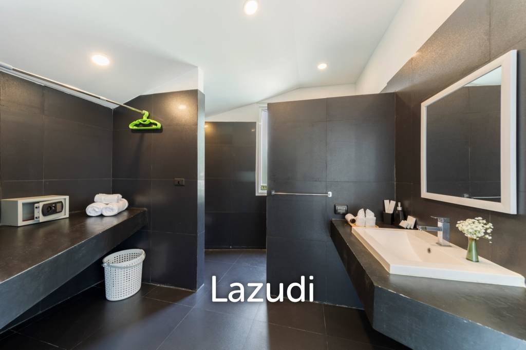 An Exquisite 11-Bedroom Hillside Villa with Ocean Views