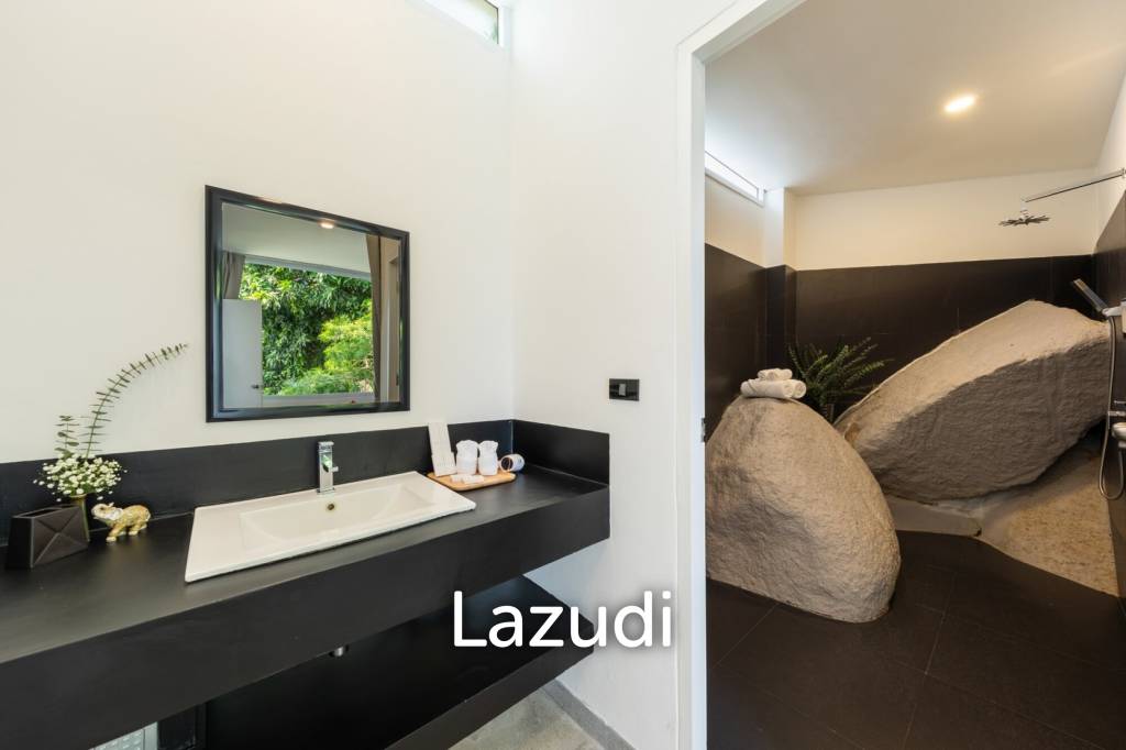 An Exquisite 11-Bedroom Hillside Villa with Ocean Views