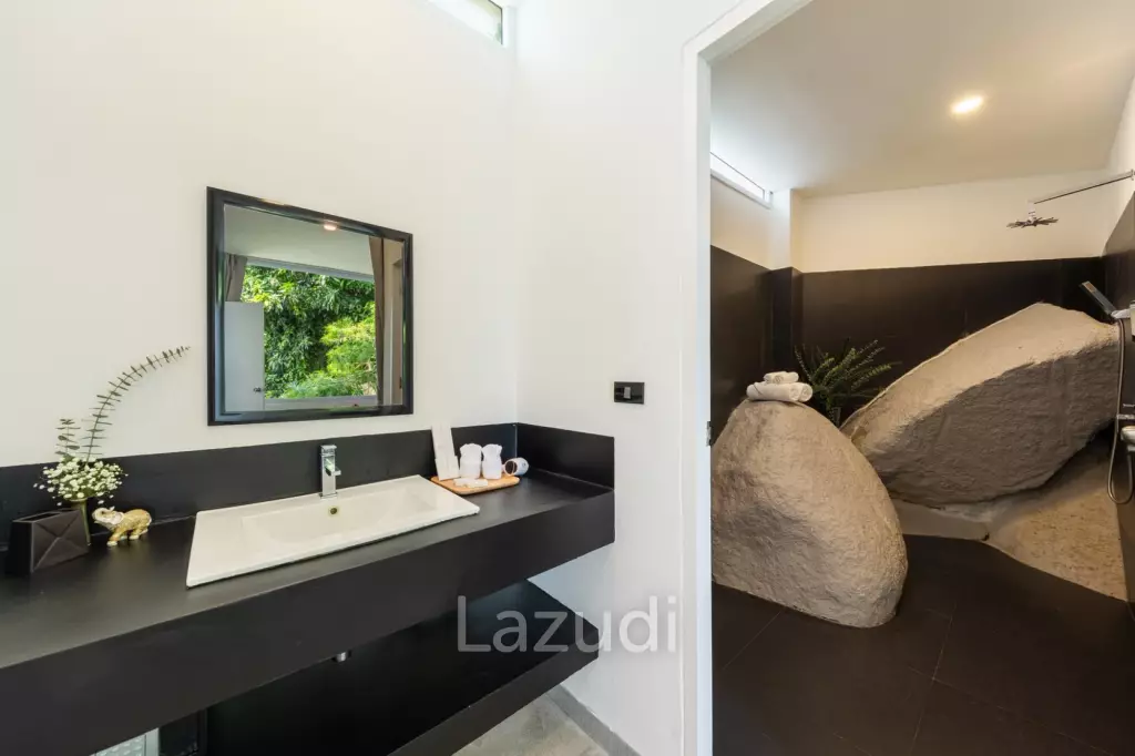 An Exquisite 11-Bedroom Hillside Villa with Ocean Views