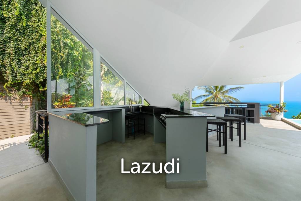 An Exquisite 11-Bedroom Hillside Villa with Ocean Views